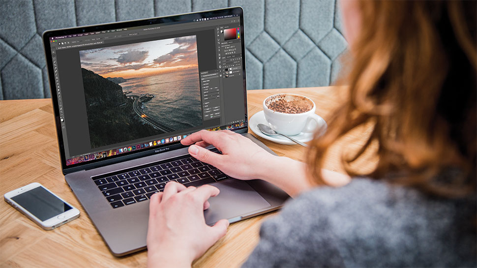 A location shot of the Macbook Pro with an iPhone beside it, shot on location with static lighting. Location shot of a Macbook Pro on location Location shot of a Macbook Pro on location Location shot of a Macbook Pro on location Location shot of a Macbook Pro on location